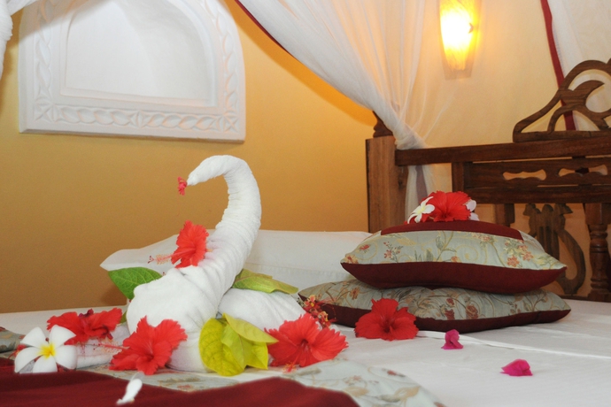 Imagen de la habitación del Hotel Ahg Waridi Beach Resort and Spa. Foto 7