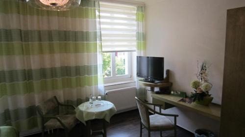 Imagen de la habitación del Hotel Ahorn. Foto 7