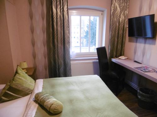 Imagen de la habitación del Hotel Ahorn. Foto 10