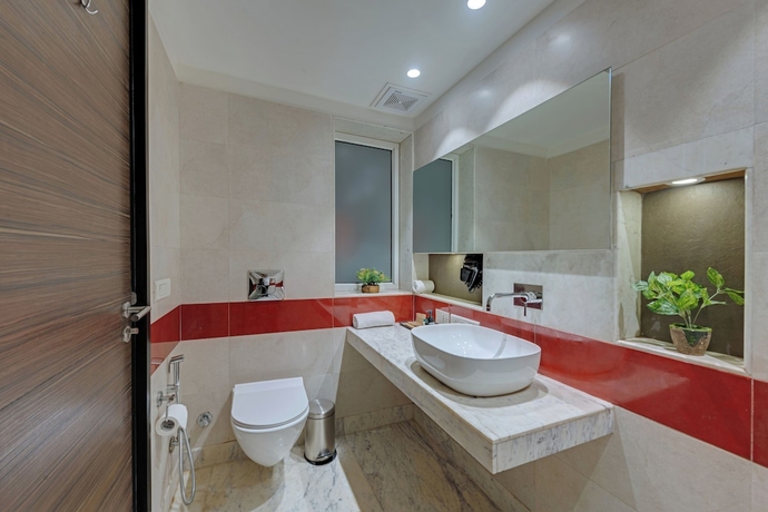 Imagen de la habitación del Hotel Ahuja Residency GCR. Foto 11