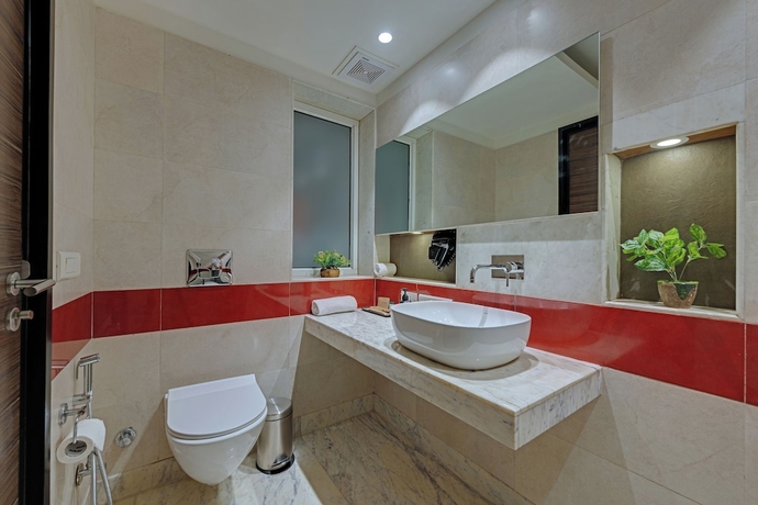Imagen de la habitación del Hotel Ahuja Residency GCR. Foto 12