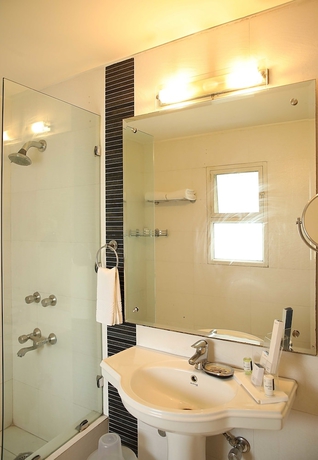 Imagen de la habitación del Hotel Ahuja Residency, Sunder Nagar. Foto 15