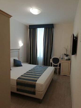 Imagen de la habitación del Hotel Ai Dogi. Foto 16