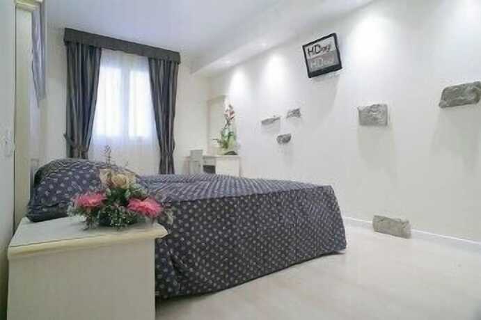Imagen de la habitación del Hotel Ai Dogi. Foto 18