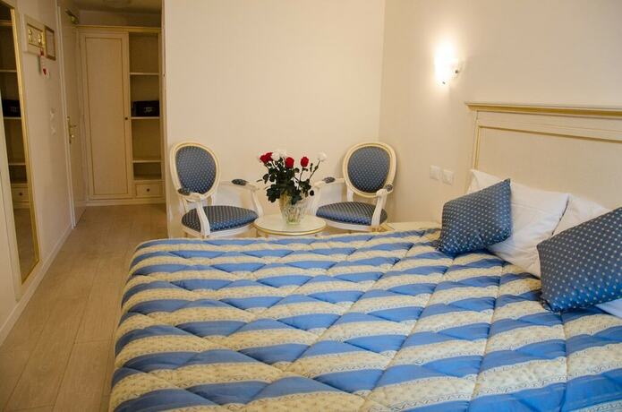 Imagen de la habitación del Hotel Ai Dogi. Foto 19