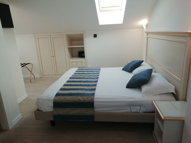 Imagen de la habitación del Hotel Ai Dogi. Foto 20
