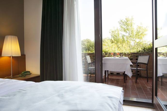 Imagen de la habitación del Hotel Ai Gelsi. Foto 11