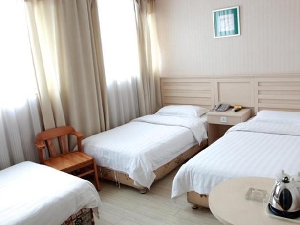 Imagen de la habitación del Hotel Ai Hua. Foto 2
