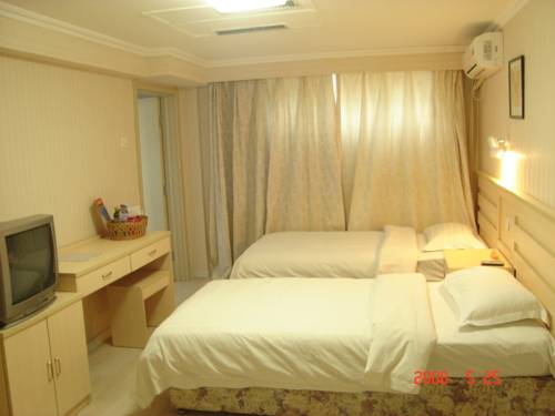 Imagen de la habitación del Hotel Ai Hua. Foto 3