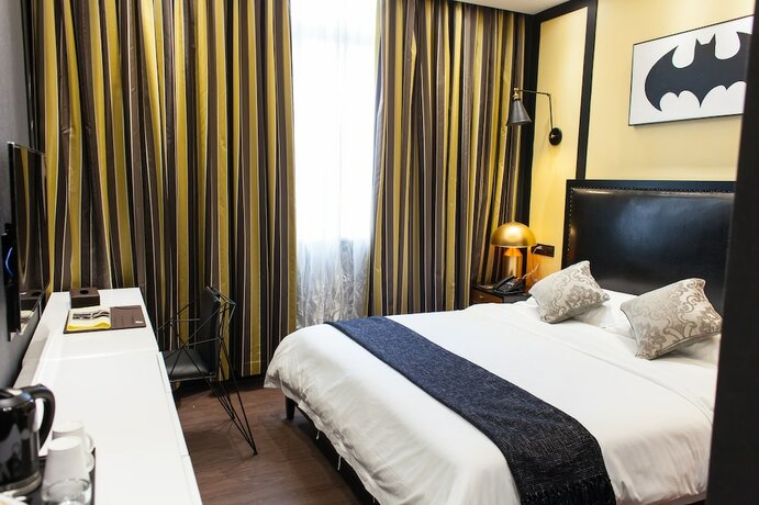 Imagen de la habitación del Hotel Ai Luo Si. Foto 4