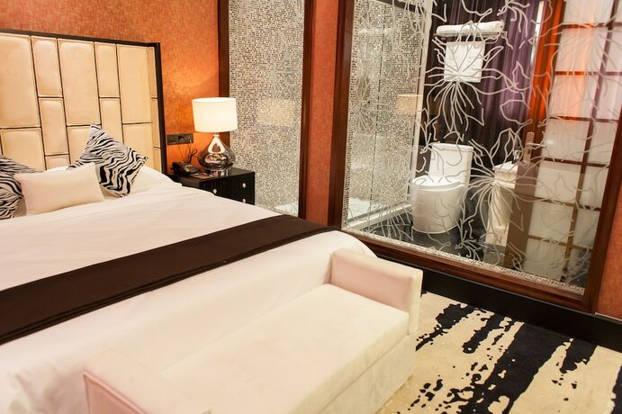 Imagen de la habitación del Hotel Ai Luo Si. Foto 7