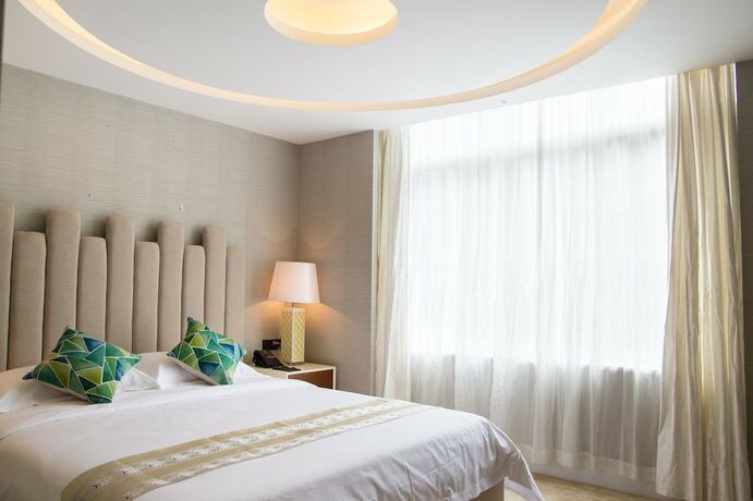 Imagen de la habitación del Hotel Ai Luo Si. Foto 8