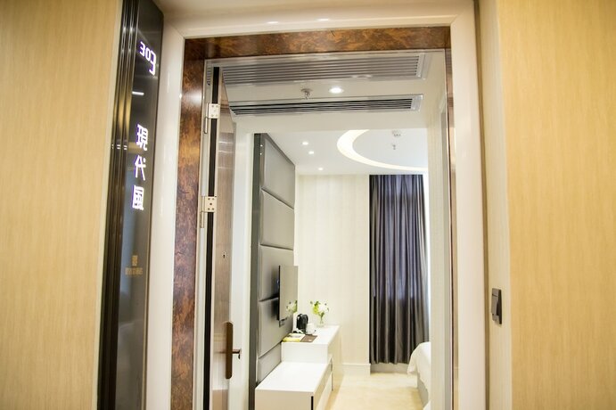 Imagen de la habitación del Hotel Ai Luo Si. Foto 9