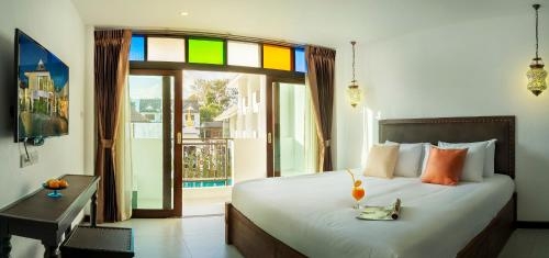 Imagen de la habitación del Hotel Ai Pai. Foto 9