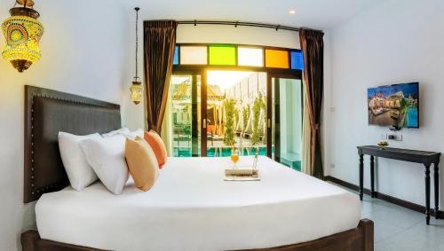 Imagen de la habitación del Hotel Ai Pai. Foto 10