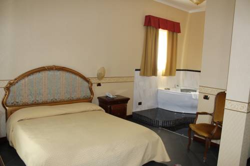 Imagen de la habitación del Hotel Ai Sette Nani. Foto 8