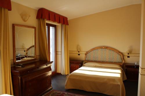 Imagen de la habitación del Hotel Ai Sette Nani. Foto 11