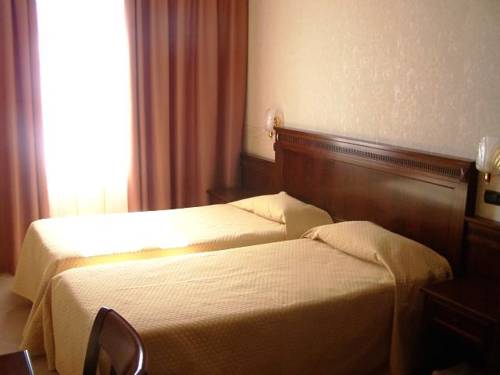 Imagen de la habitación del Hotel Ai Sette Nani. Foto 16
