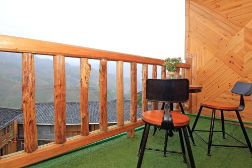 Imagen de la habitación del Hotel Ai Shang Jia Guesthouse. Foto 6