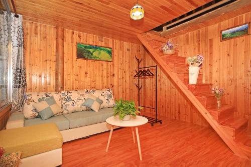 Imagen de la habitación del Hotel Ai Shang Jia Guesthouse. Foto 7