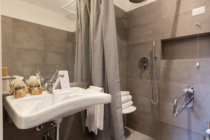 Imagen de la habitación del Hotel Ai Suma. Foto 7