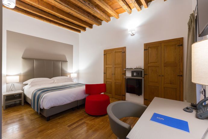 Imagen de la habitación del Hotel Ai Suma. Foto 9