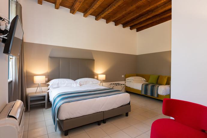 Imagen de la habitación del Hotel Ai Suma. Foto 10