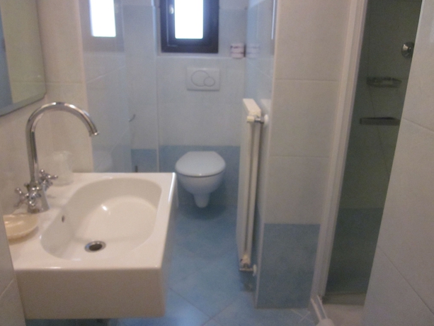 Imagen de la habitación del Hotel Ai Tolentini. Foto 9