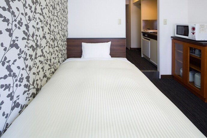Imagen de la habitación del Hotel Ai Yokohama. Foto 16