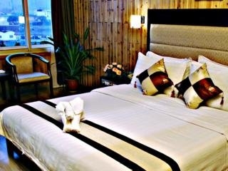 Imagen de la habitación del Hotel Ai Yuan. Foto 5