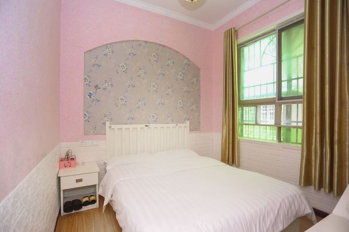 Imagen de la habitación del Hotel AiShang Hostel. Foto 2
