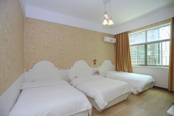 Imagen de la habitación del Hotel AiShang Hostel. Foto 3