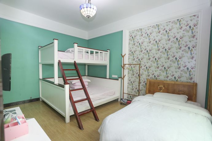 Imagen de la habitación del Hotel AiShang Hostel. Foto 5