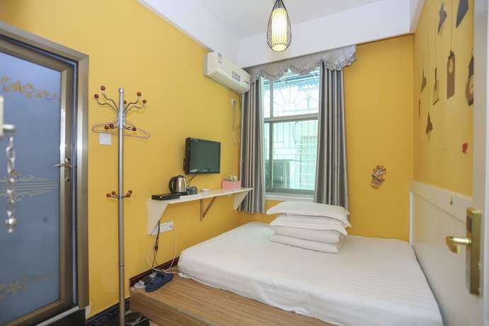 Imagen de la habitación del Hotel AiShang Hostel. Foto 6