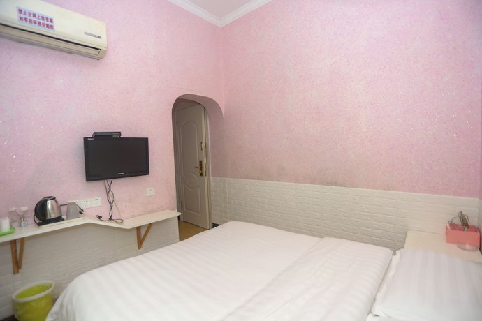 Imagen de la habitación del Hotel AiShang Hostel. Foto 10
