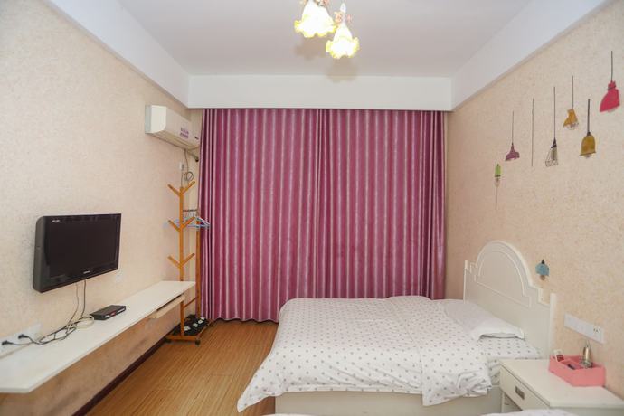 Imagen de la habitación del Hotel AiShang Hostel. Foto 12