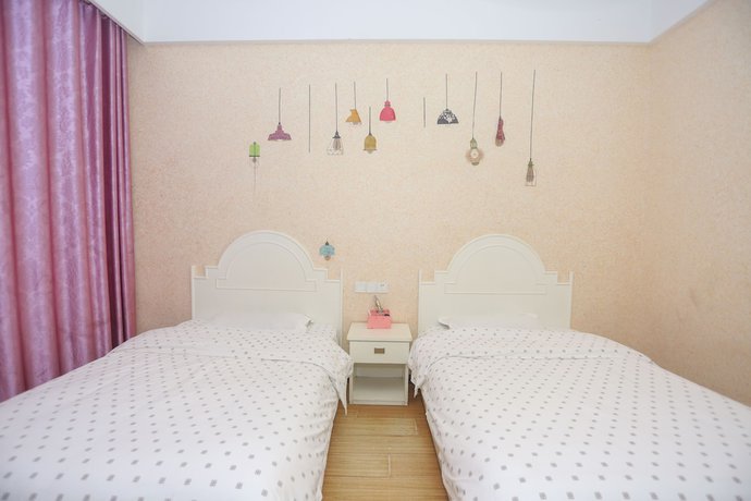 Imagen de la habitación del Hotel AiShang Hostel. Foto 14