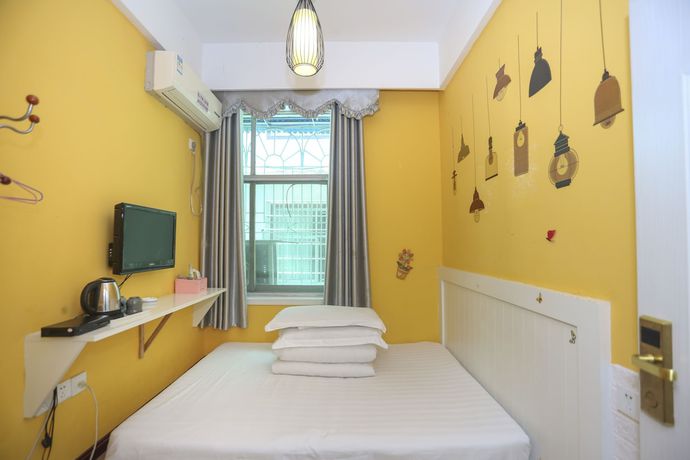 Imagen de la habitación del Hotel AiShang Hostel. Foto 15