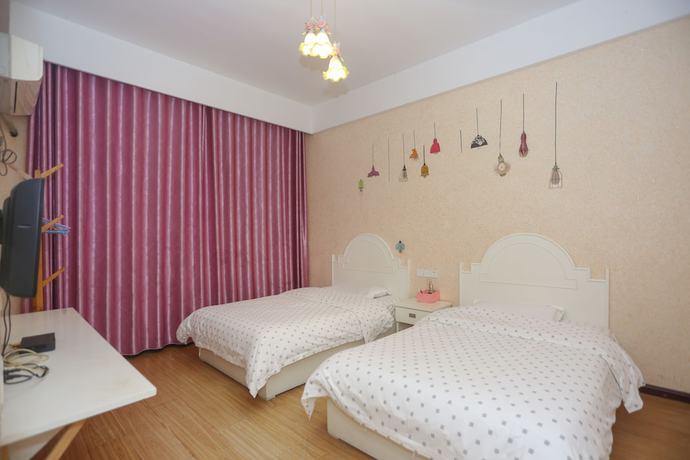 Imagen de la habitación del Hotel AiShang Hostel. Foto 17