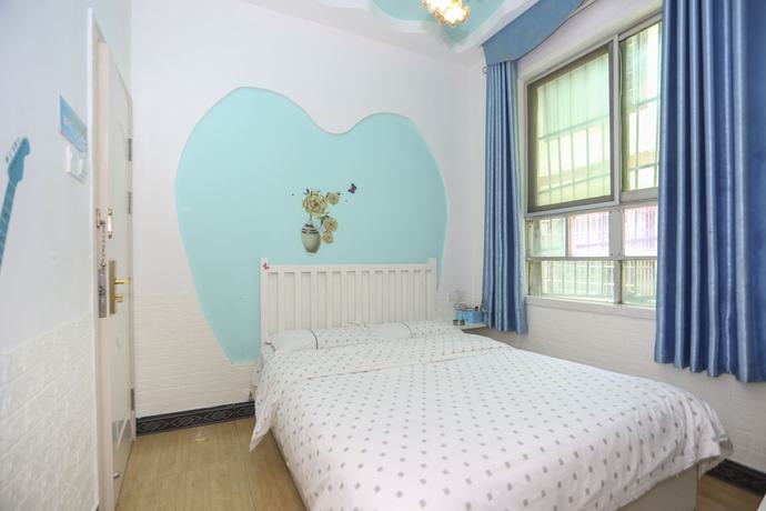 Imagen de la habitación del Hotel AiShang Hostel. Foto 18