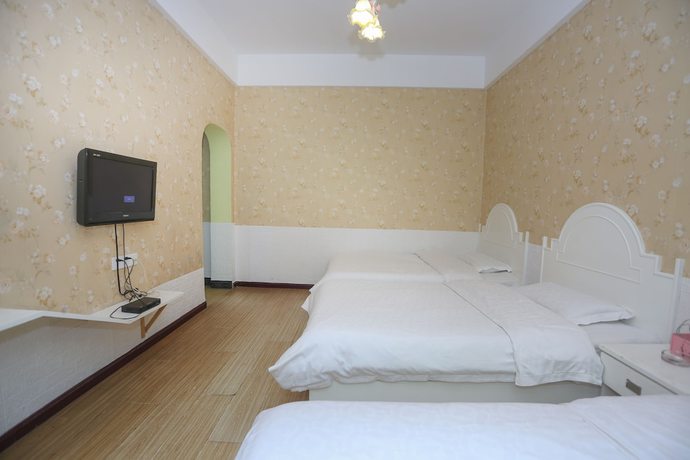Imagen de la habitación del Hotel AiShang Hostel. Foto 20