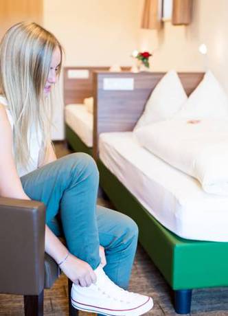 Imagen de la habitación del Hotel Aichingerwirt. Foto 7