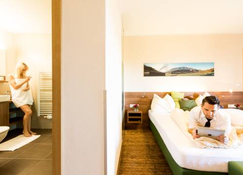 Imagen de la habitación del Hotel Aichingerwirt. Foto 15