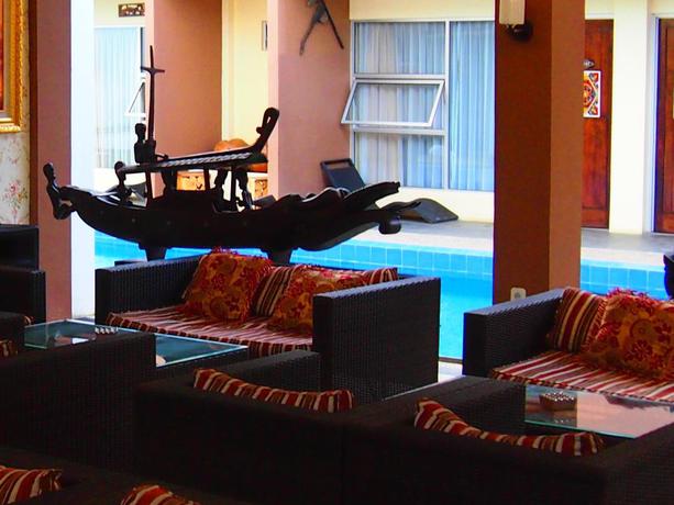 Imagen del bar/restaurante del Hotel Aie Angek Cottage. Foto 2