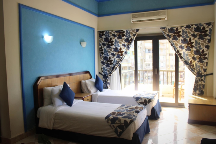 Imagen de la habitación del Hotel Aifu Resort. Foto 9