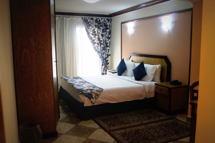 Imagen de la habitación del Hotel Aifu Resort. Foto 14