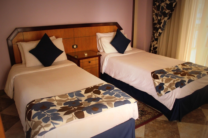 Imagen de la habitación del Hotel Aifu Resort. Foto 15