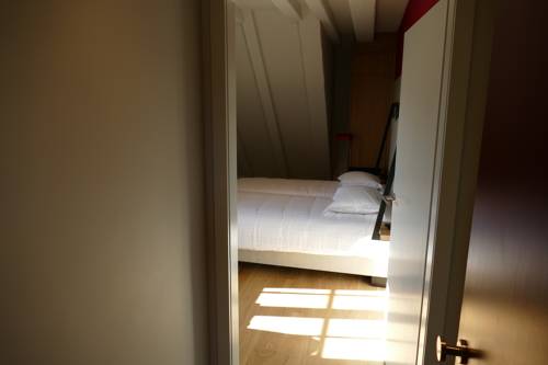 Imagen de la habitación del Hotel Aigle D'or. Foto 12