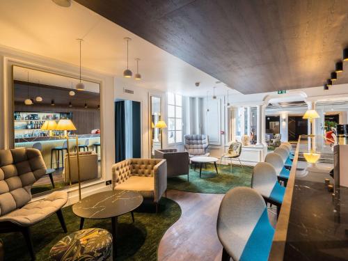 Imagen del bar/restaurante del Hotel Aigle Noir Fontainebleau Mgallery. Foto 12