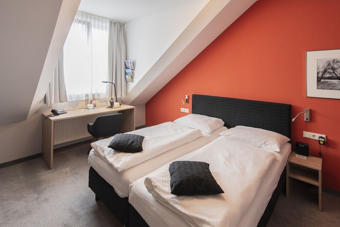 Imagen de la habitación del Hotel Aigner. Foto 4